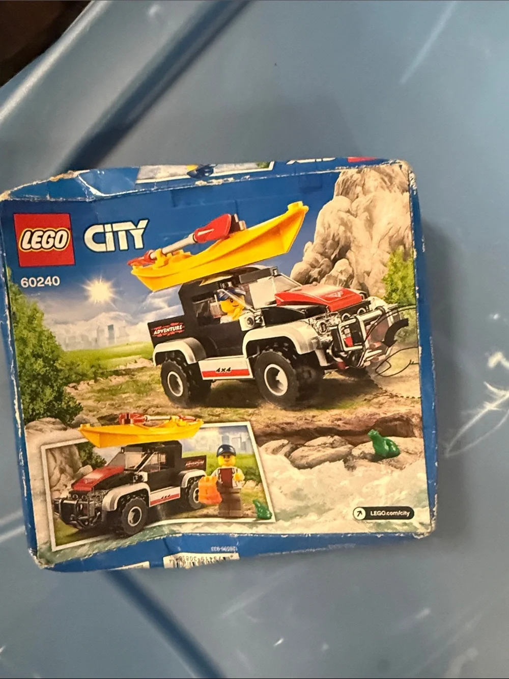 LEGO City Red, Yellow & Black Off-Road Rescue Truck with Kayak